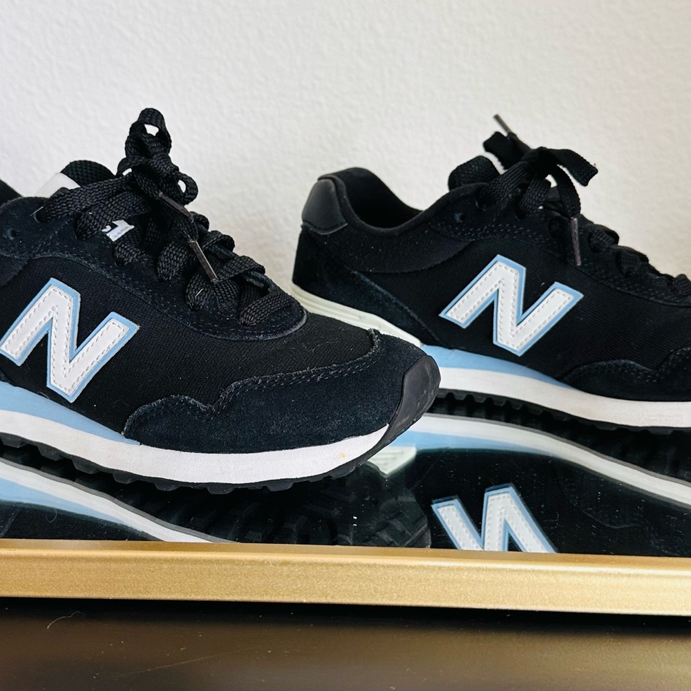 New Balance Black Sneakers with White Accents
